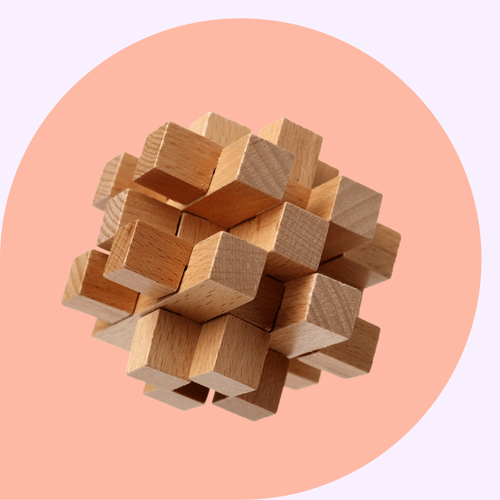 CRM software solutions for 2026, symbolized by a wooden cube.