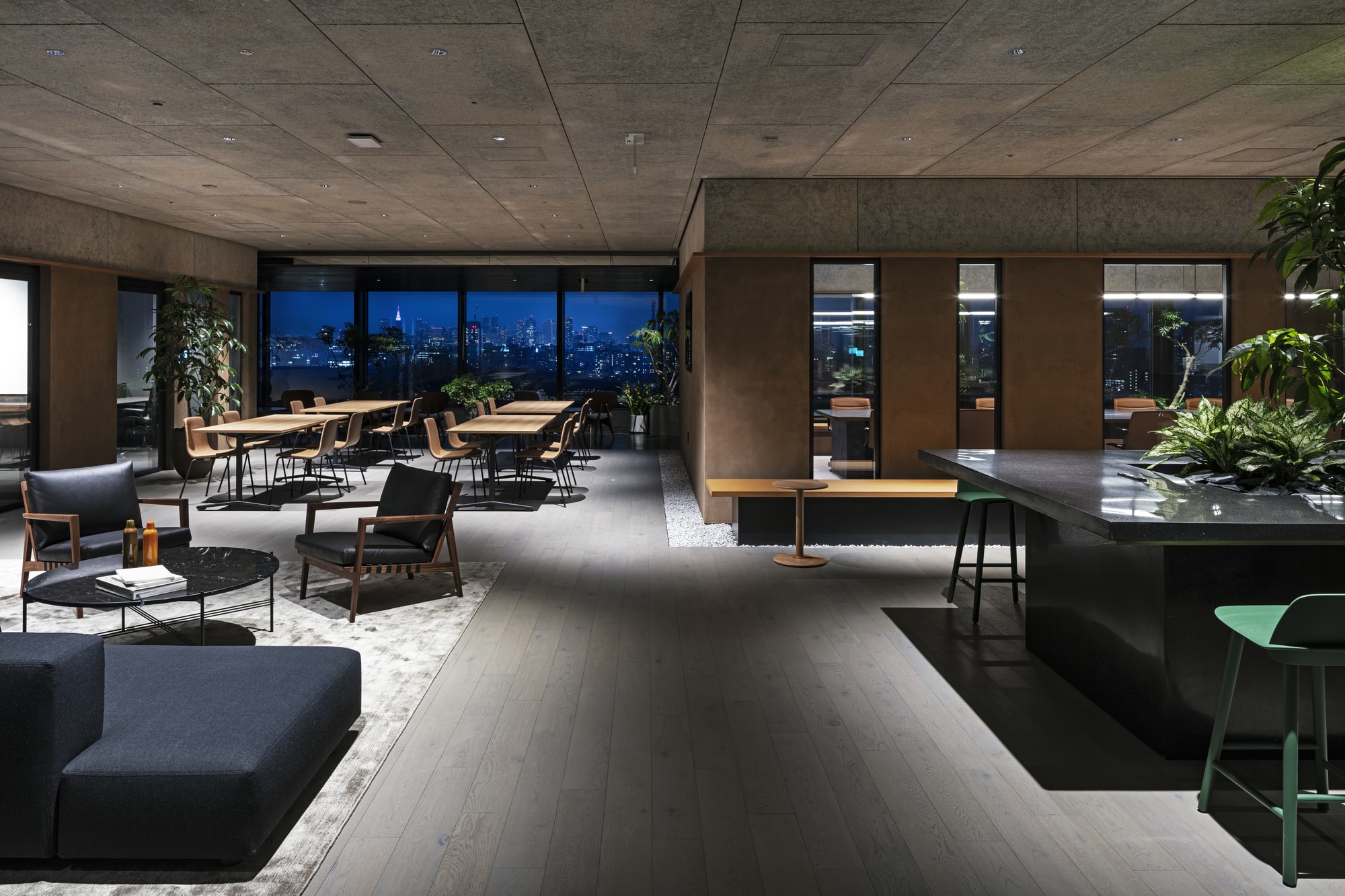 Photograph of Japanese office with tables in guest area