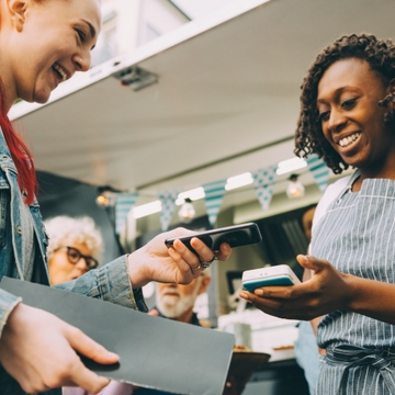 A Stripe client and their customer engaging over a sale
