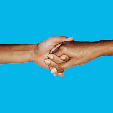 A pair of hands grasping each other