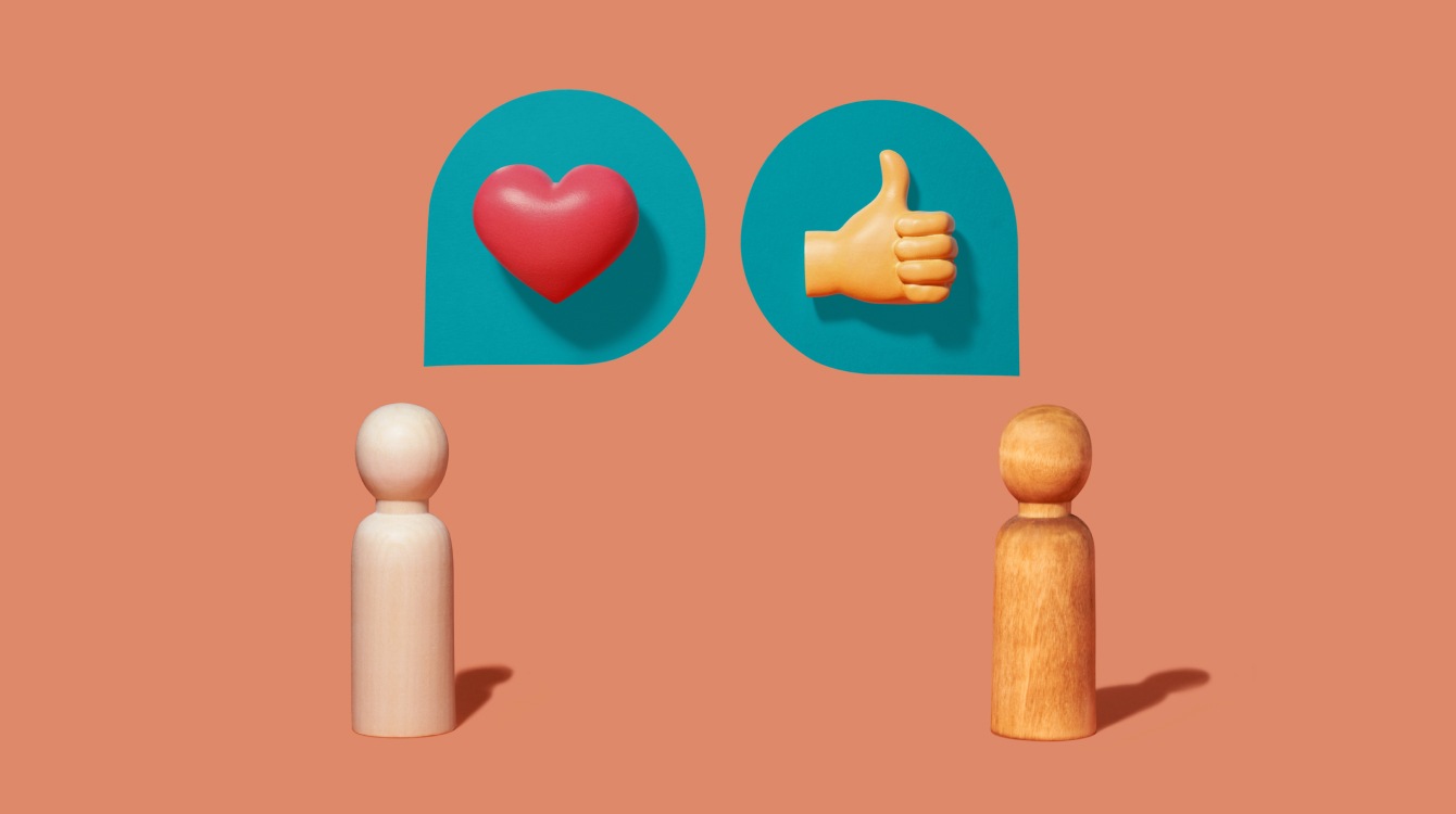 Two stick people with a heart and thumbs up representing customer service