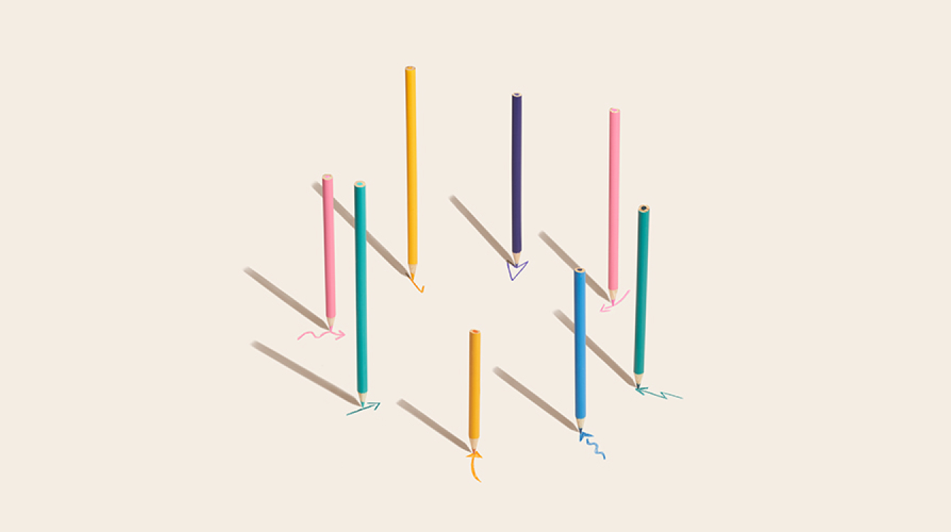 Different colour pencils drawing arrows