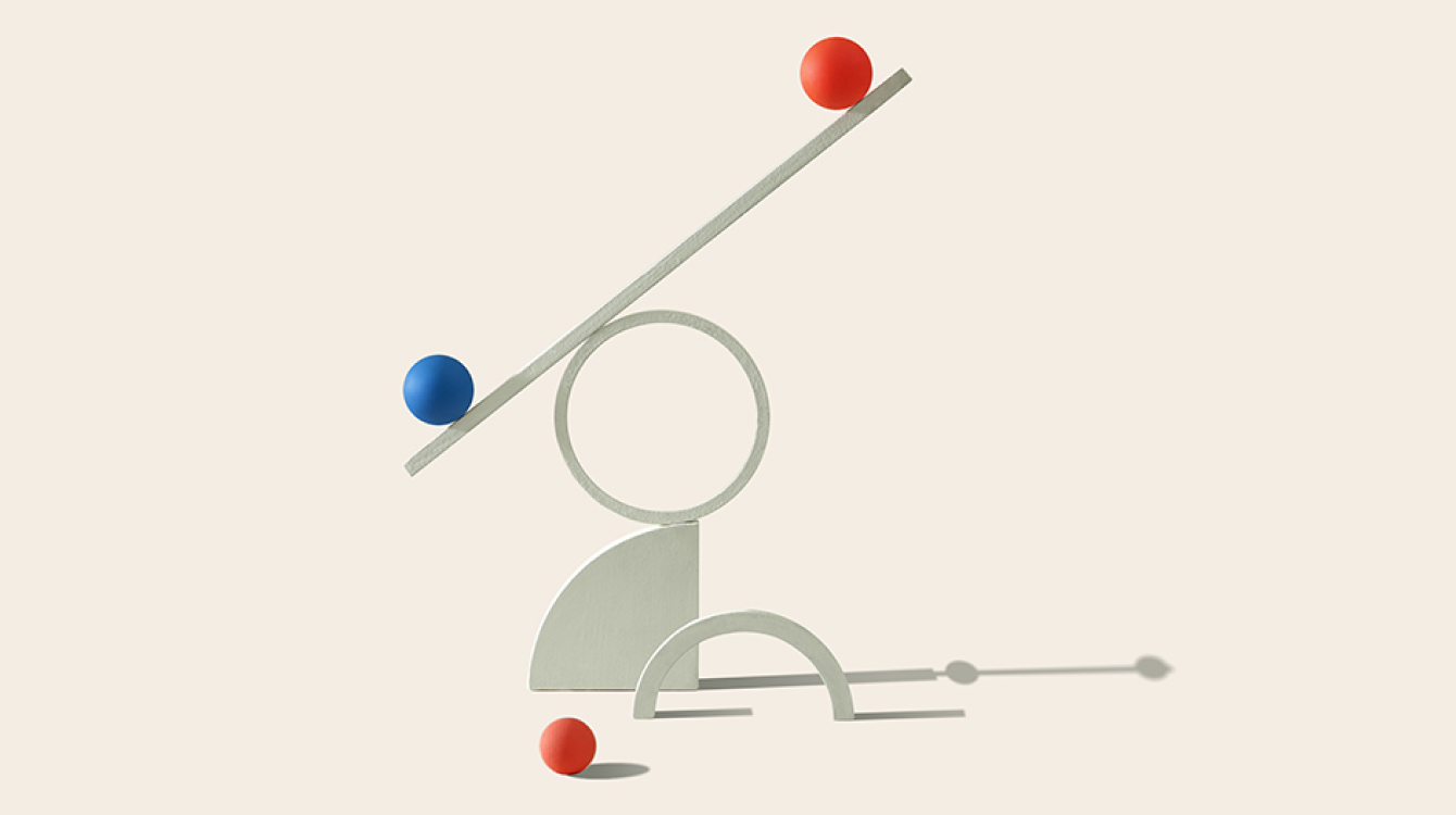balls balancing on objects